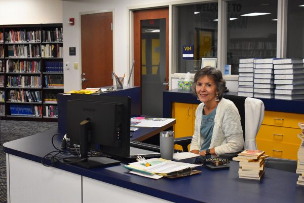 Mrs. Goddard is an essential to the VLC. She helps students with checking out books, helps with technical difficulties, and lets students study in their free time in the VLC. I think we have a really good administration, facility, and student body. I love the spirit and energy, its a really fun place to work, Goddard said.