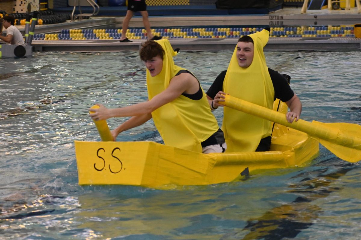 Juniors Seth Conner and Seth Waites race in the grand championship of the annual Physics Boat Race. 