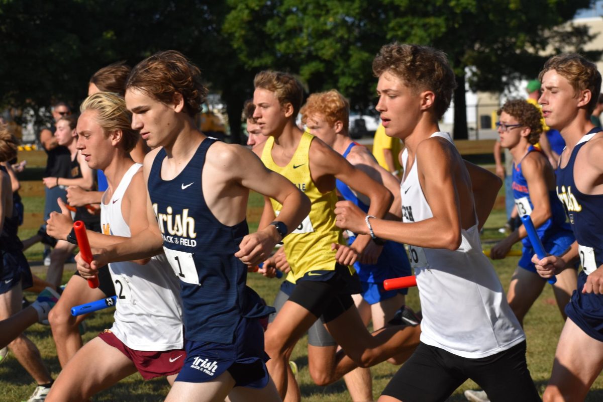 Junior, Harden Olson is mid sprint for the Mooresville relay. Olson was running with over ten other schools. “I like that our team pushes each other so hard and no matter what were grateful for our team. I had a calf injury that was realy difficult to come back from but being pushed by my team really helped,” Olson said.