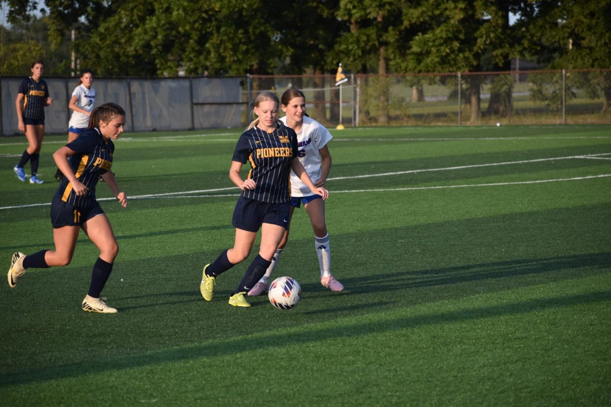 Freshman Brooklyn Rawlins takes the ball in the game against Martinsville. 