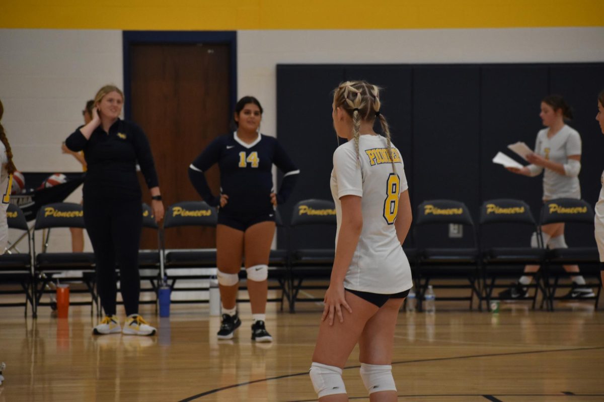 Sophomore Kaitlyn Hadley gets herself ready to watch the ball. She was super prepared for this year. “It’s important to focus during a game because it is a group effort and we can’t mess around,” Hadley said. 
