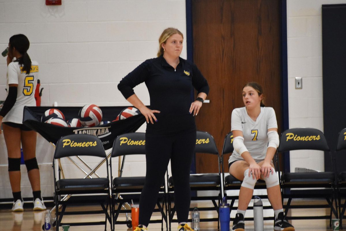 Coach Molly Armstrong watches her team play. She’s a big encouragement for the girls. “She will just stand there and watch us,” sophomore Karsyn Crane-Stringer said.