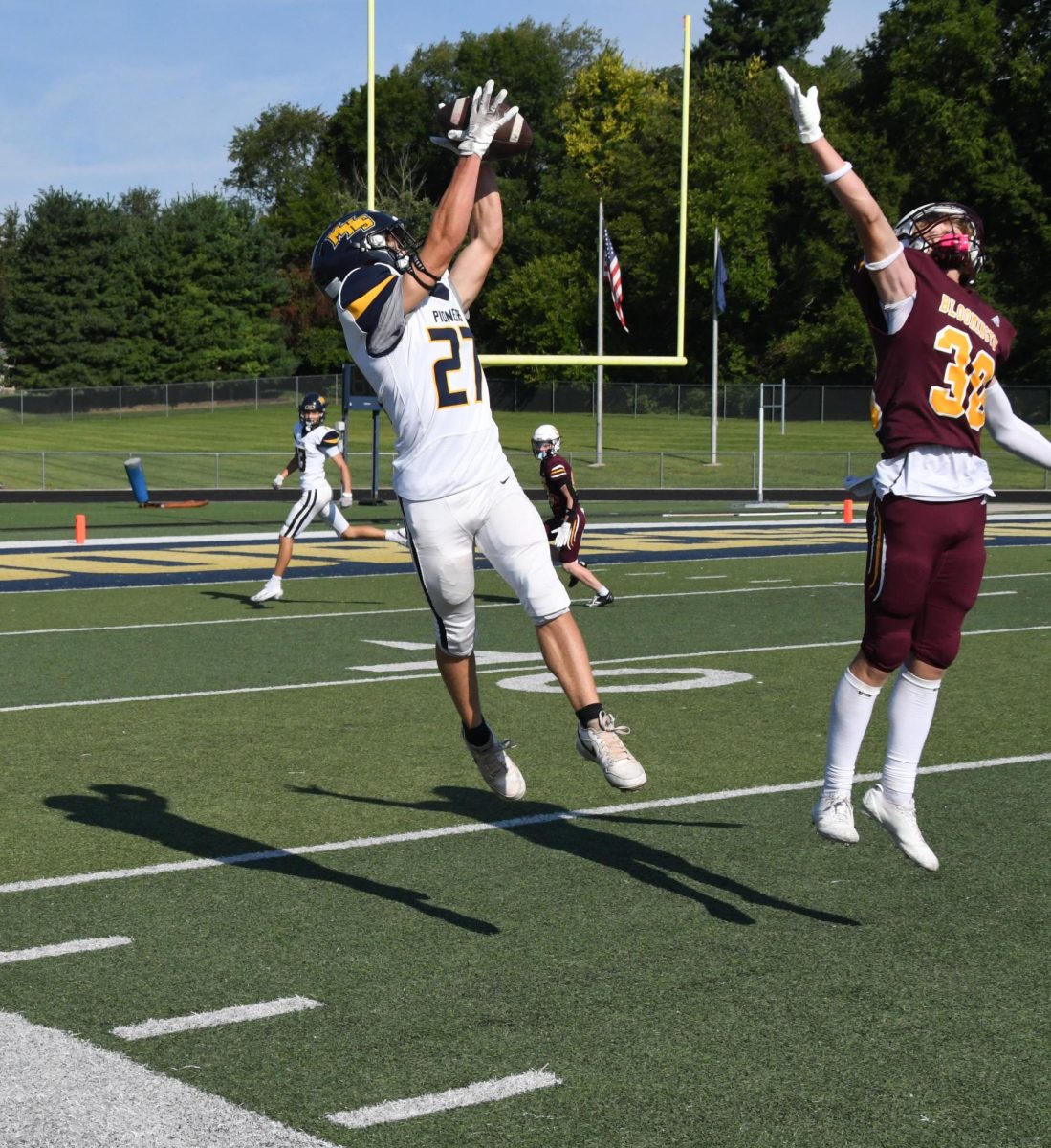 Sophomore Cooper Jones jumps to catch the football. Jones also scored one of the touchdowns during the game. “I was running a jet stop, I had to jump and get my feet in bounds,” Jones said.