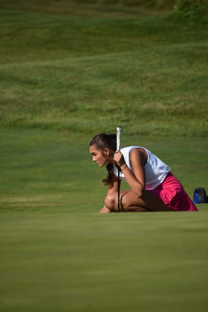 Senior Addison Farley contemplates her next shot during a match against Cascade.