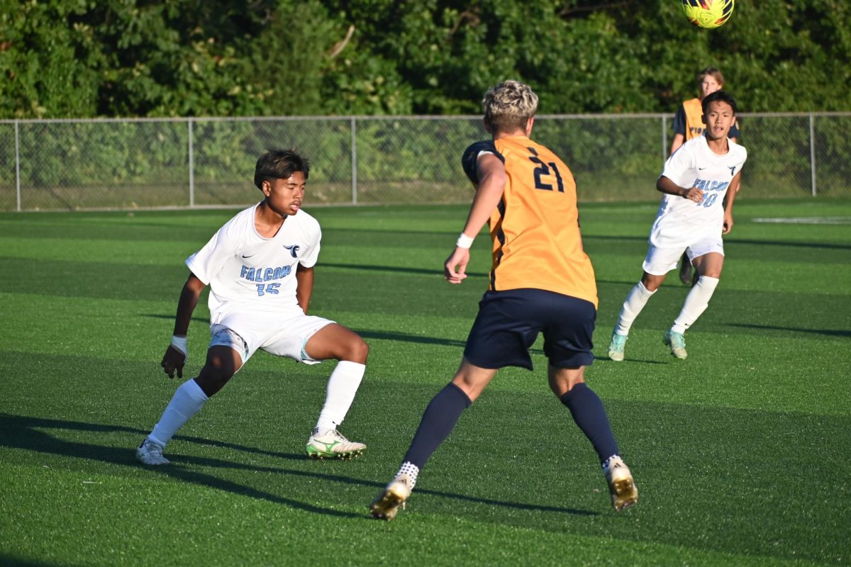 Senior Bryce Bodell hustles to recover the ball in their game against Perry Meridian.