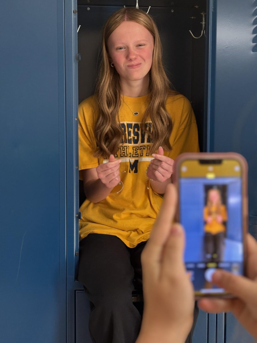 Students in photography get creative while taking photos.