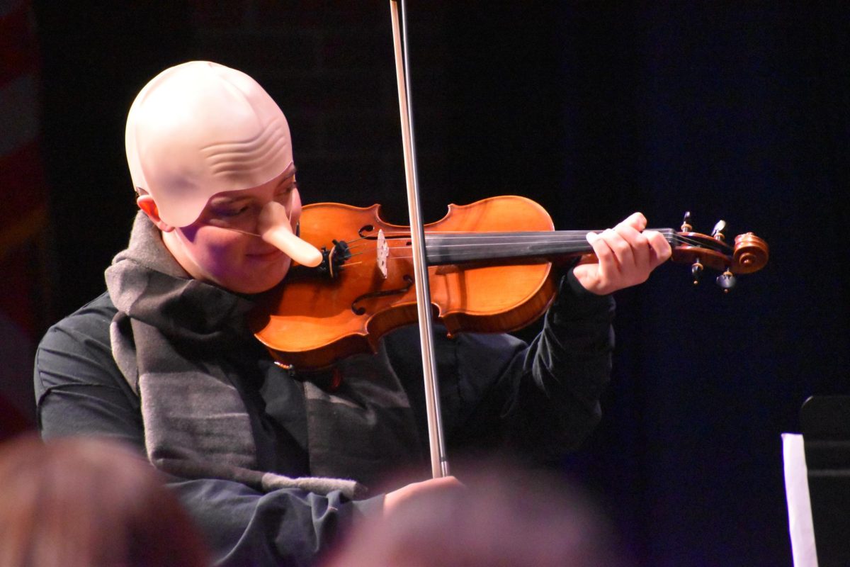 Orchestra performs in costumes for their Halloween concert, Octoboo.