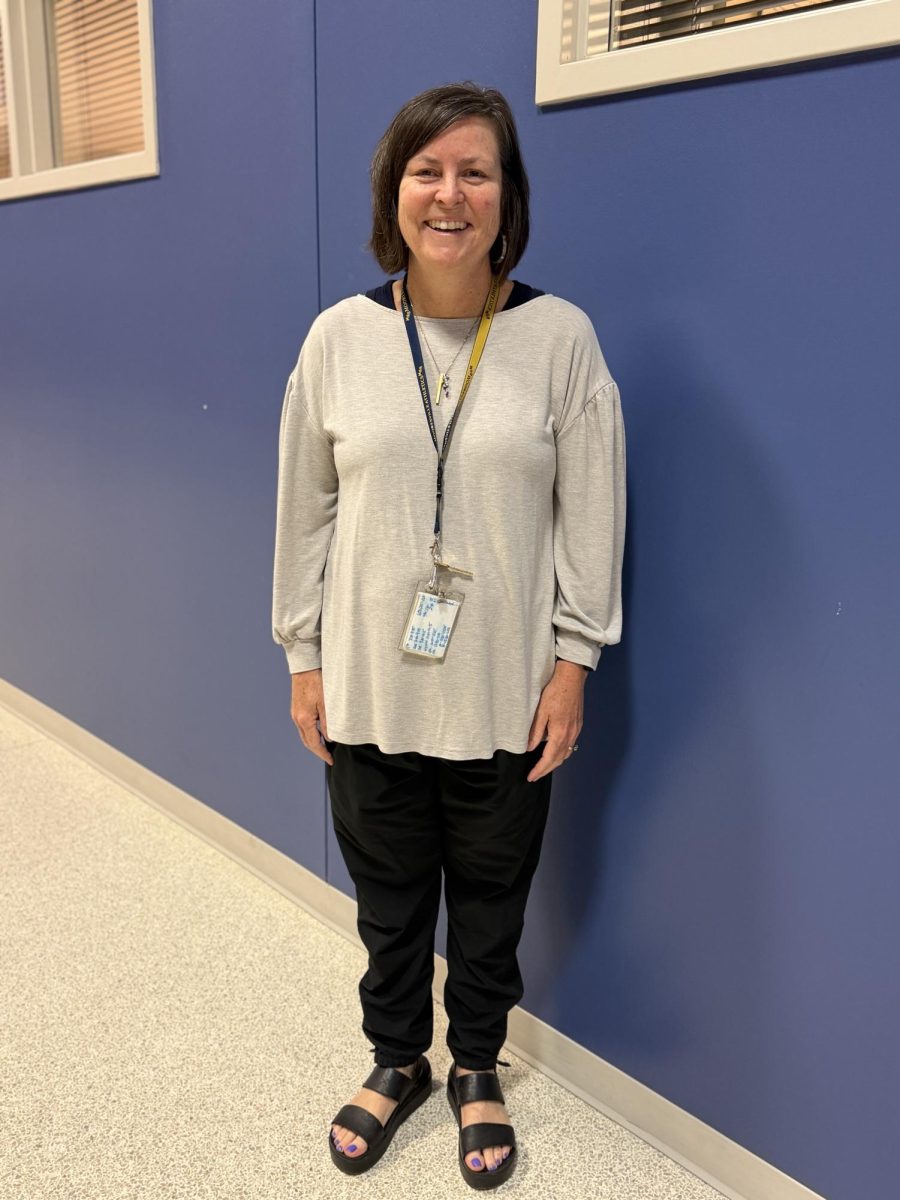 Honored teacher Jenny Gaston poses for a photo.